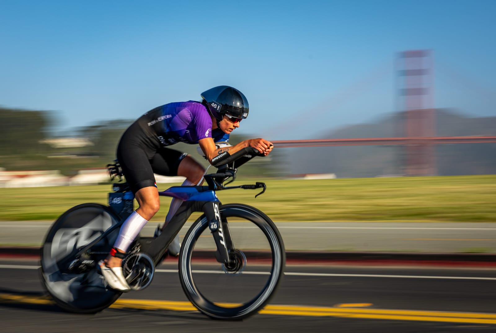 Professional triathlete in aerodynamic racing position